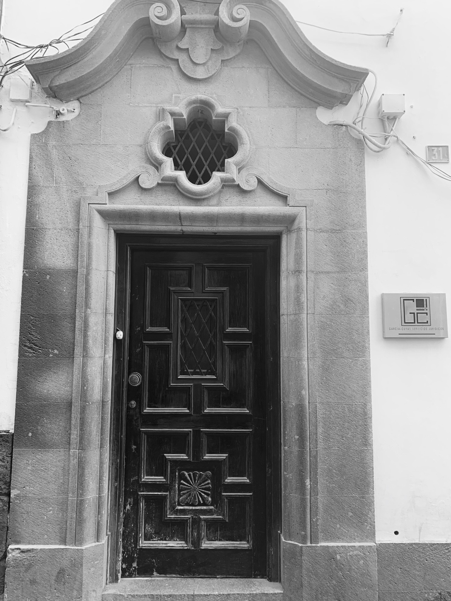 Puerta Despacho Abogados García-Cuyás